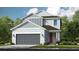 Two-story home with gray siding, gray garage door, and red front door at 8437 Skye Ranch Blvd, Sarasota, FL 34241