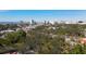 Aerial perspective of neighborhood, highlighting tree-lined streets and buildings at 850 S Tamiami Trl # 724, Sarasota, FL 34236