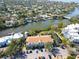 Aerial view of waterfront community with buildings and landscaping at 850 S Tamiami Trl # 724, Sarasota, FL 34236