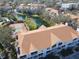 Condo community with tennis courts, pool, and pond at 850 S Tamiami Trl # 724, Sarasota, FL 34236