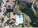 Aerial view of community pool and tennis court at 850 S Tamiami Trl # 724, Sarasota, FL 34236