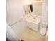 Clean bathroom featuring a vanity, toilet, and tiled flooring at 850 S Tamiami Trl # 724, Sarasota, FL 34236