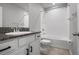 Bathroom featuring a granite-topped vanity and a bathtub with tile surround at 8737 Daydream St, Sarasota, FL 34238