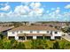 Rear exterior of multi-Gathering home with a private screened patio at 8737 Daydream St, Sarasota, FL 34238