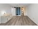 Bedroom with built-in shelving and hardwood floors at 8767 Midnight Pass Rd # 505F, Sarasota, FL 34242