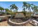 Island Reef community entrance with landscaping at 8767 Midnight Pass Rd # 505F, Sarasota, FL 34242