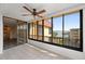 Sunroom offers water views and access to balcony at 8767 Midnight Pass Rd # 505F, Sarasota, FL 34242