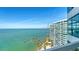 Stunning view from the condo of the turquoise ocean, pier, and beachfront property at 888 Blvd Of The Arts # 1608, Sarasota, FL 34236