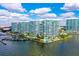 Aerial view of high-rise condo buildings, marina, and waterfront at 888 Blvd Of The Arts # 1608, Sarasota, FL 34236