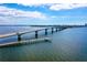 Aerial view of a bridge over clear, blue water at 888 Blvd Of The Arts # 1608, Sarasota, FL 34236