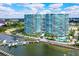 Stunning waterfront condominium building with a private marina and luxurious amenities including a pristine pool at 888 Blvd Of The Arts # 1608, Sarasota, FL 34236