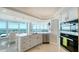 Gourmet kitchen featuring a center island, stainless appliances, and views of the waterfront at 888 Blvd Of The Arts # 1608, Sarasota, FL 34236