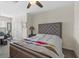 Bedroom with queen-size bed and built-in closet at 8995 Milestone Dr, Sarasota, FL 34238