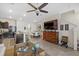 Kitchen with island and breakfast bar overlooks the living and dining area at 8995 Milestone Dr, Sarasota, FL 34238