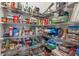 Well-stocked pantry with ample shelving for storage at 8995 Milestone Dr, Sarasota, FL 34238