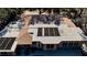 Aerial shot of the house roof shows solar panels installed, offering energy efficiency and sustainability to the home at 951 Contento St., Siesta Key, FL 34242