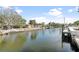 Waterfront canal with private docks for boating and fishing in a quiet neighborhood at 951 Contento St., Siesta Key, FL 34242