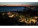 Beachfront estate at dusk with ocean view at 1067 Westway Dr, Sarasota, FL 34236