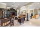Home bar with seating, wine storage, and a TV at 1067 Westway Dr, Sarasota, FL 34236
