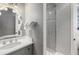 Small bathroom with gray tile and a glass shower at 1067 Westway Dr, Sarasota, FL 34236