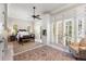Bright bedroom with a wooden bed and white built-in cabinets at 1067 Westway Dr, Sarasota, FL 34236