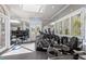Bright home gym with various exercise equipment at 1067 Westway Dr, Sarasota, FL 34236