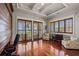 Home office with built-in shelving and ocean view at 1067 Westway Dr, Sarasota, FL 34236