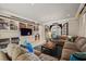 Spacious playroom with built-in shelving and comfortable seating at 1067 Westway Dr, Sarasota, FL 34236