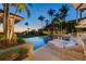 Luxury pool with lounge chairs and ocean view at 1067 Westway Dr, Sarasota, FL 34236