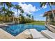 Resort-style pool with spacious patio and lounge chairs at 1067 Westway Dr, Sarasota, FL 34236