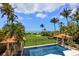 Resort-style pool with ocean views and gazebo at 1067 Westway Dr, Sarasota, FL 34236
