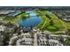 An overhead view of a golf course with a club house and parking at 10726 Old Grove Cir, Bradenton, FL 34212