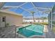 Beautiful screened-in pool with paved patio, perfect for outdoor enjoyment at 10726 Old Grove Cir, Bradenton, FL 34212