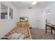 Quaint bedroom with neutral carpet and a view of the doorway at 1208 Francis Ave, Sarasota, FL 34232