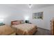 Comfortable bedroom with a bed, neutral walls, and natural light from a window at 1208 Francis Ave, Sarasota, FL 34232