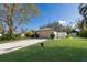 Lovely home featuring a well-kept lawn and a convenient two-car garage at 1208 Francis Ave, Sarasota, FL 34232