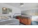 Enclosed hot tub and adjacent mirror, perfect for relaxation and enjoying the pool view at 1208 Francis Ave, Sarasota, FL 34232