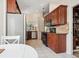 Kitchen area with stainless steel appliances and plenty of cabinet space at 1358 Berkshire Ct, Venice, FL 34292