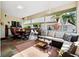 Wide screened lanai with dining and living areas perfect for entertaining, and scenic views at 1358 Berkshire Ct, Venice, FL 34292