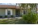 Charming single-story house with well-maintained lawn and stone accents at 1406 14Th Street W Ct, Palmetto, FL 34221