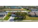 Well-maintained single-Gathering home with mature trees and a spacious driveway at 1406 14Th Street W Ct, Palmetto, FL 34221