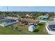 Features fenced yard, shed, small trailer, and covered patio at 1406 14Th Street W Ct, Palmetto, FL 34221