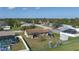 Features fenced yard, shed, small trailer, and covered patio at 1406 14Th Street W Ct, Palmetto, FL 34221