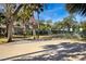 Enjoy outdoor fun with a basketball court under the sunny skies at 1529 Oak Way, Sarasota, FL 34232