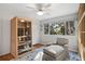 Bright bedroom featuring sauna, comfortable seating, and a large window at 1529 Oak Way, Sarasota, FL 34232