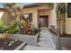 Inviting front entryway with decorative plants and a striking double door at 1529 Oak Way, Sarasota, FL 34232