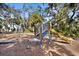 A fun playground with swings and slide for outdoor activities at 1529 Oak Way, Sarasota, FL 34232