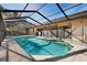 A screened-in swimming pool area provides outdoor relaxation and recreation at 1529 Oak Way, Sarasota, FL 34232