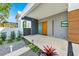 Modern home exterior with wood and stone accents at 2149 Hyde Park St, Sarasota, FL 34239
