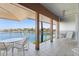 Waterfront balcony with seating offers panoramic views and relaxing outdoor space at 225 Sands Point Rd # 6204, Longboat Key, FL 34228